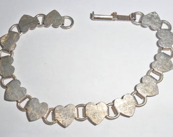 Pretty delicate vintage goldtone hearts link bracelet