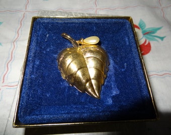 Avon Brooch with cologne.