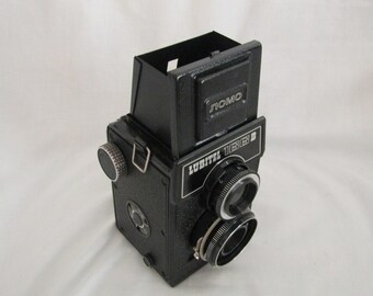 Lubitel Camera with lens cap and case • vintage