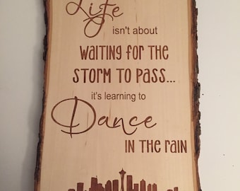 life isn't about waiting...learning to dance in the rain sign