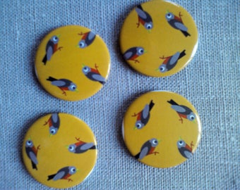 Button magnets round birds mustard background