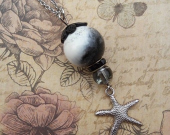 Necklace with ball and starfish