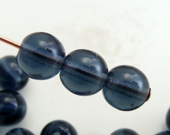 6mm Czech Druk Beads Round Transparent Montana Blue (20pk) si-6DK-TMB