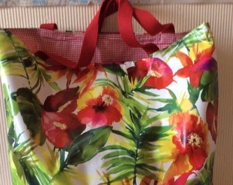 Red and green waxed canvas tote bag