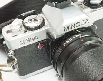 Minolta XG-A Vintage slr 35mm film camera non-working