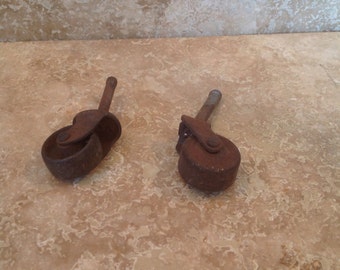 2 mismatched vintage casters