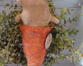 Jackers, our primitive rabbit hanger sitting in his our prim carrot