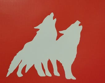 Two wolves howling decal sticker