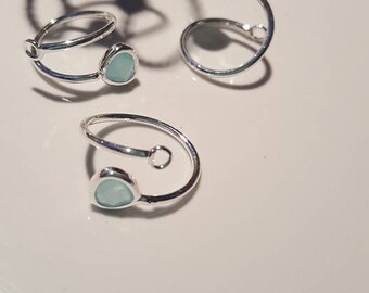 The ring with Crystal and silver ring holder! light green