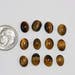 Craft Supply Sale - Tiger Eye Cabochons - 6 x 8 mm - Package of 12 stones