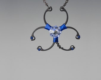 Blue Swarovski Crystal Biohazard Pendant, Swarovski Necklace, Light Sapphire Swarovski Crystal, Wire Wrapped Pendant, Biohazard Blue v6