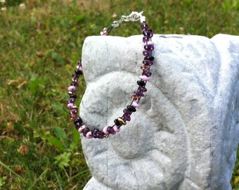 Chic purple/pink/black/gold-coloured bracelet