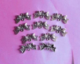 Set of 10 knots silver 20x10mm