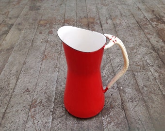 Red enamelware Dansk Kobenstyle pitcher . By Jens Quistgaard . 1950s mid century modern