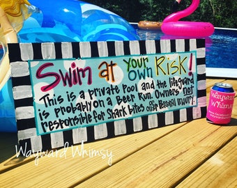 Swim At Your Own Risk pool sign