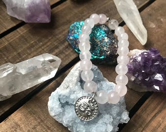 Om rose quartz beaded bracelet