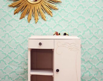 Gold and pale pink bedside table