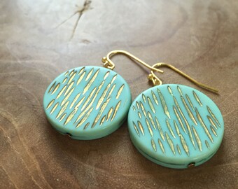 Vintage Stripes - Pair of limited edition dangling earrings with round vintage beads, lightblue, with stripes, metallic gold. blue