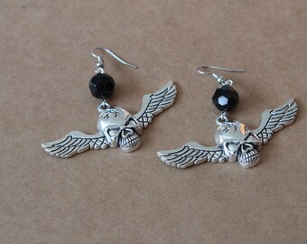 Black winged skull earrings