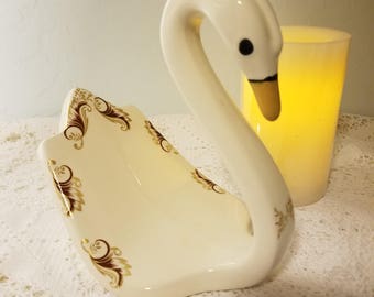 Porcelain swan towel holder