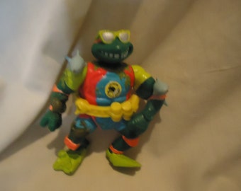 Vintage 1990 TMNT Teenage Mutant Ninja Turtles Sewer Surfin Mike Action Figure Toy by Mirage Studios, collectable