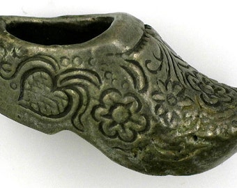 Vintage travel clog charm with holland stamped on foot