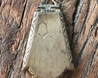 Vintage brass sweetheart locket