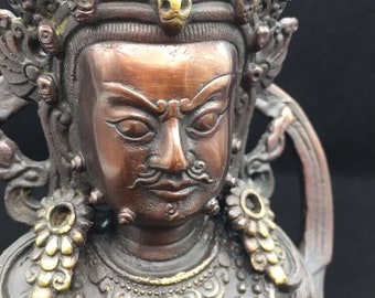 copper and bronze Buddhist statue Jambala