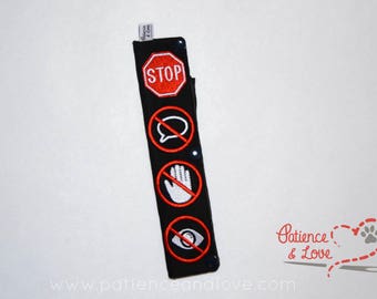 1 Sleeve with 4 VERTICAL embroidered symbols on each side, stop - no talk - no touch - no eye contact, Snap-On, both sides are the same
