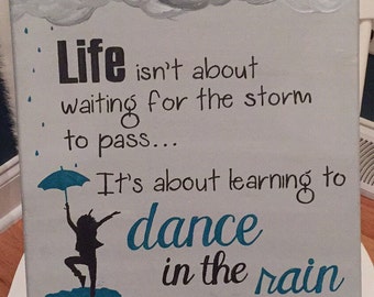 Dance in the rain sign