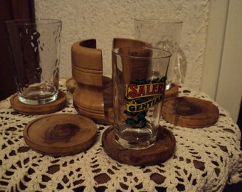 Under glass in olive wood.