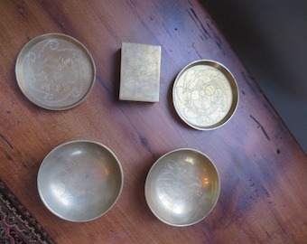 Vintage brass match box holder with matching dishes or ash trays