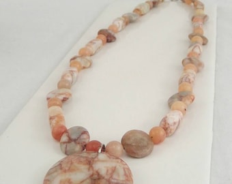 Peach necklace with pendant