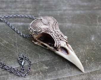 lacy magpie bird skull necklace