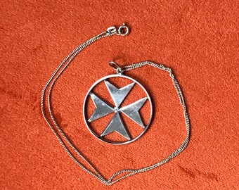 Silver pendant on a chain