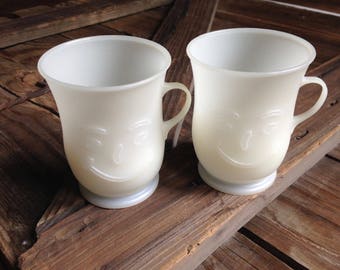 two Kool Aid mugs/retro plastic Kool Aid cups