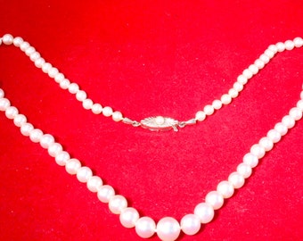 Pearl necklace w. progression