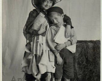 Barefoot children dressed as hobos antique photo