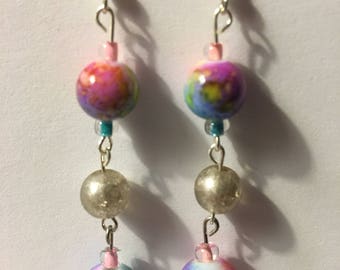 Multi color beads and silver earrings.