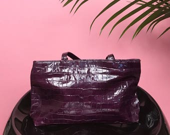 Purple patent alligator bag
