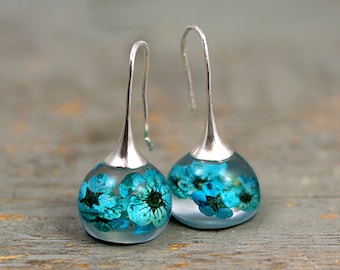Real blossom earrings. Turquoise real flowers in resin spheres. Silver ox earwires. Big earrings. Gift for her.