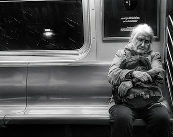 Woman resting on train