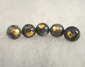 Sardonyx beads with gold leaf hearts