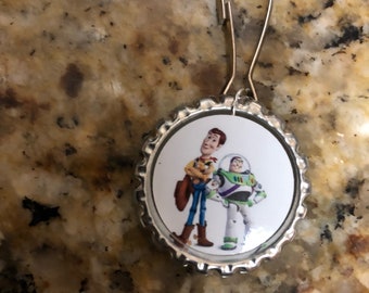 Buzz lightyear and woody zipper pull