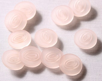 7 buttons 18mm pale pink stem textured (7428)