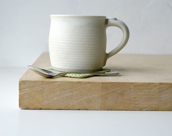 Two tankard style stoneware pottery tea mugs - glazed in vanilla cream