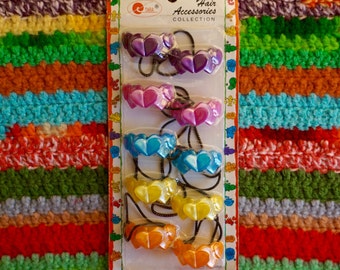 Vintage 90s Kitschy Colorful Opalescent Pastel Adorable Hair Ties.Never Been Used.Vintage 90s Colorful Opalescent Heart Shaped Hair Ties.