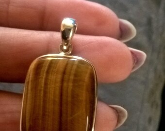 sterling silver tigers eye stone pendant