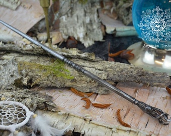 Magic wand named "Michs-Raka" made entirely by hand, and having a tangerine quartz encrusted at its end