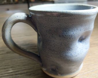 Blue handmade ceramic mug.